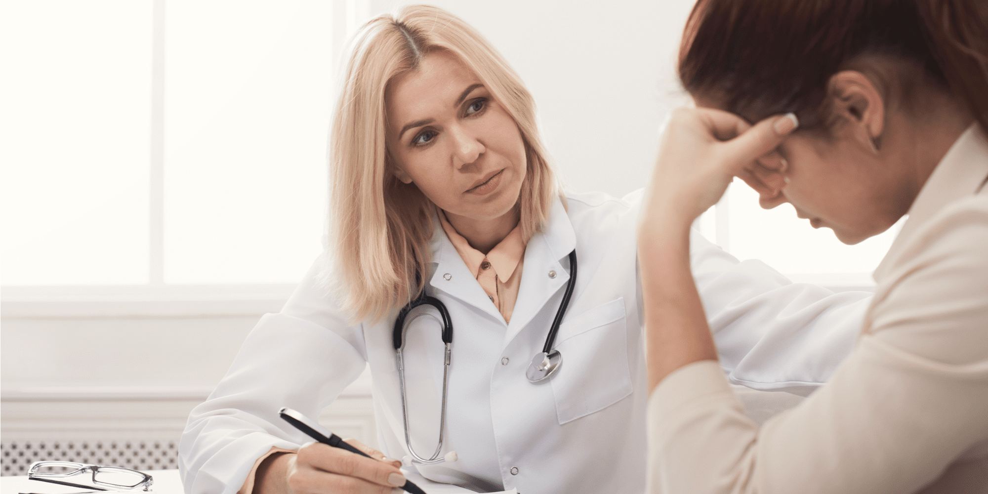 Doctor helping patient with relapse