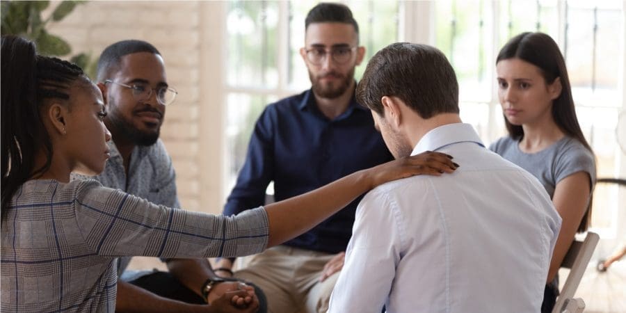 Group meeting talking about depression at mental health facility