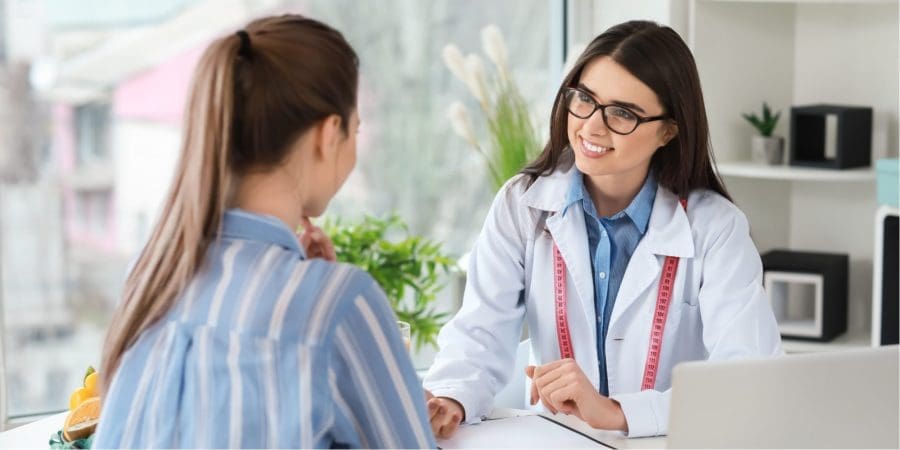 Patient asking doctor questions about the recovery center