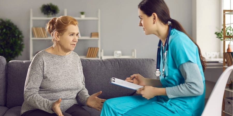 Patient explaining her schizophrenia issues to the medical doctor