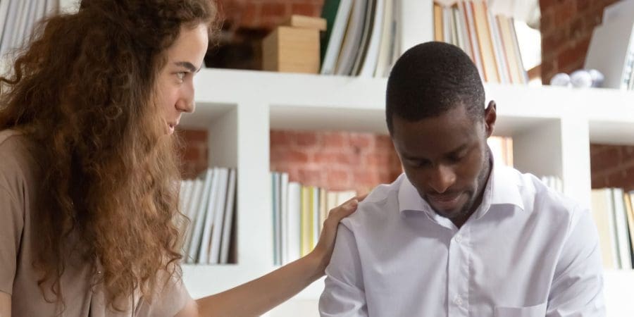 Therapist helping another person