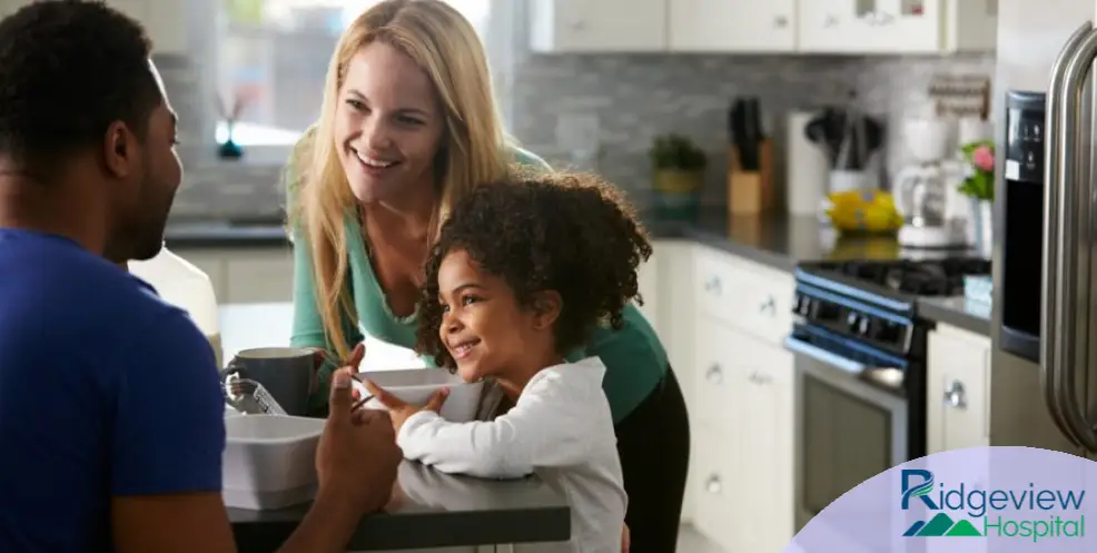 family happy at the kitchen