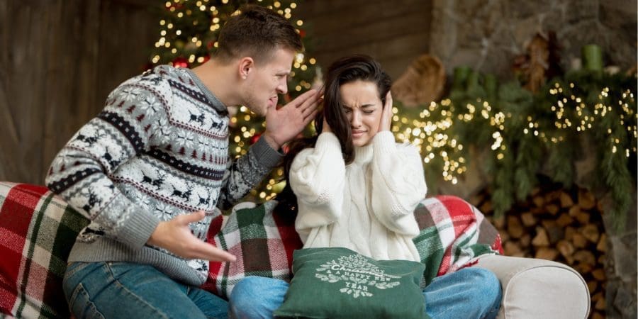 man arguing with woman Christmas holiday
