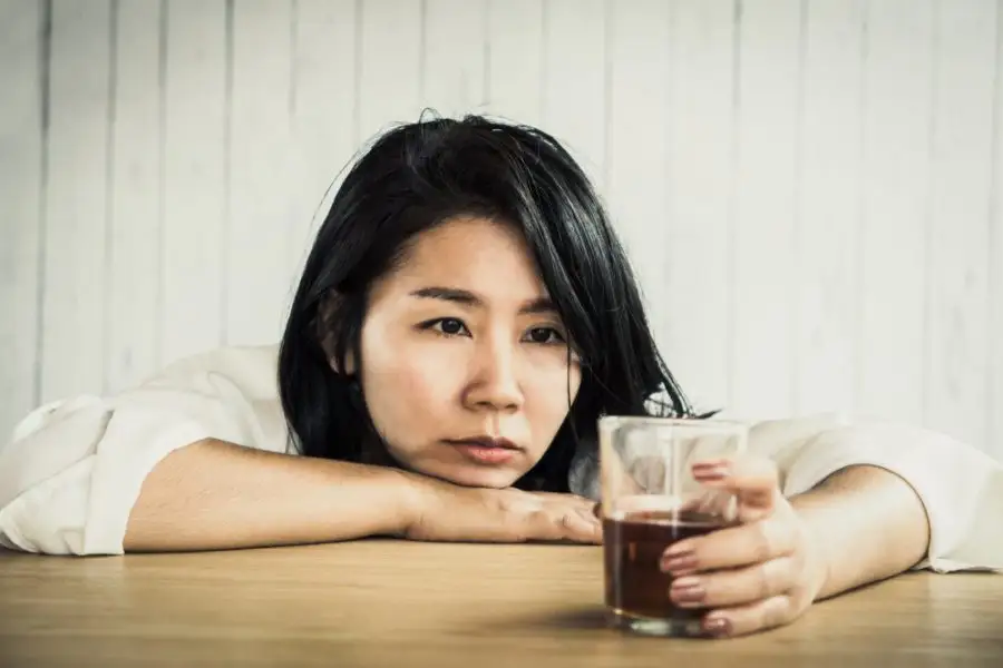 woman drinking alcohol